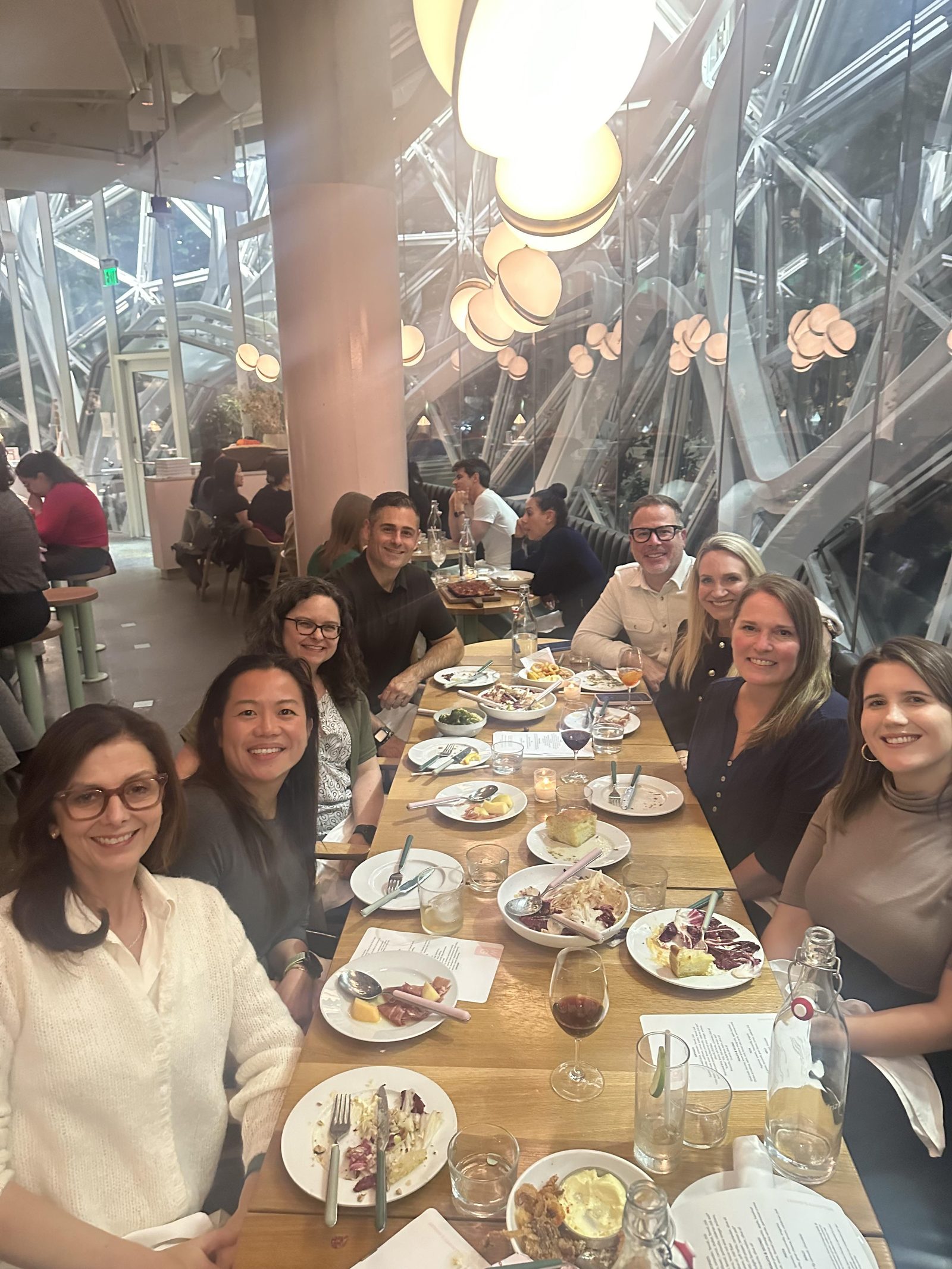 Members at dinner inside the Amazon Spheres in Seattle