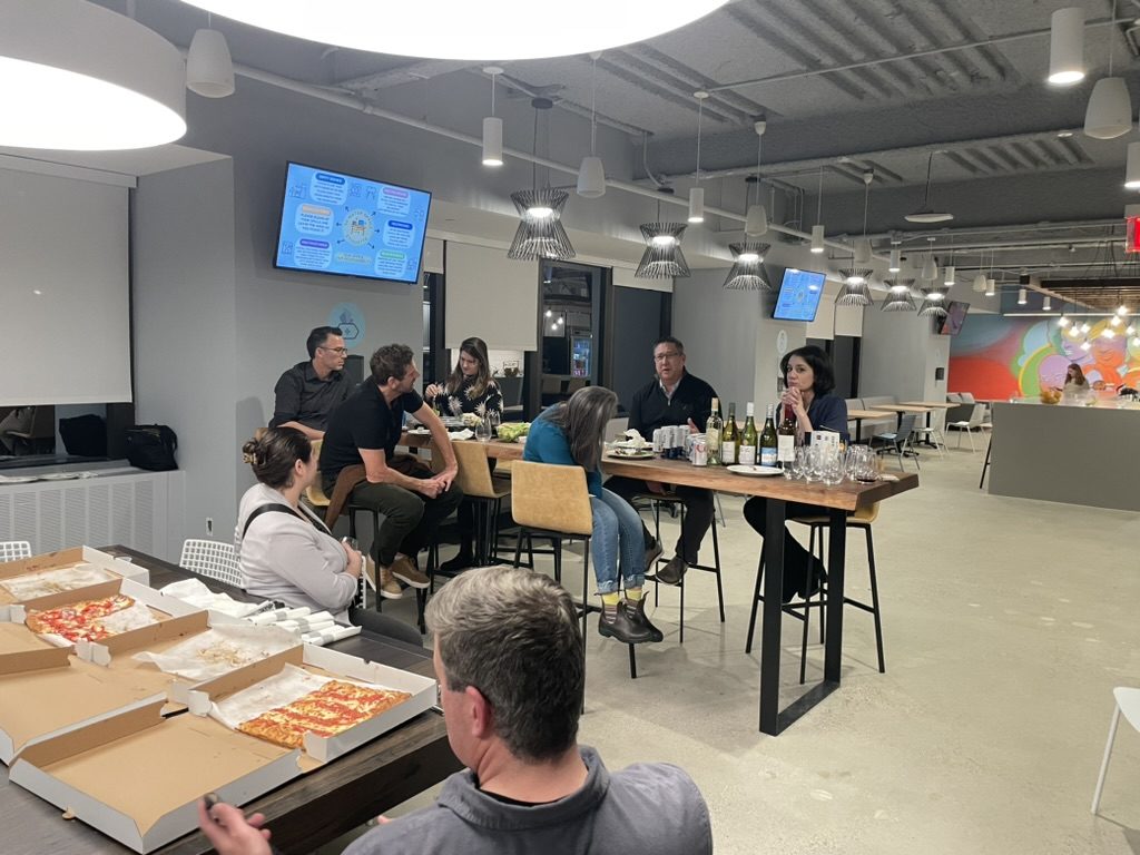 Members at a pizza-and-ideas session